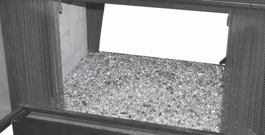Partially fi ll the burner pan with the granules*, up to the burner tube (see Fig. 8-1). *Note: Use only select sand for natural gas burners and vermiculite for propane gas burners. 2.