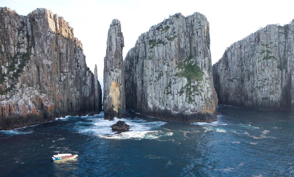 Tasman Island Cruises Tasman Island Cruises provides unforgettable three hour wilderness cruises along the spectacular coastline between Port Arthur and Eaglehawk Neck in southern Tasmania.