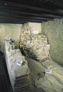 Part of the hypocaust (ancient underfloor warm air heating system), including the praefurnium where air was heated is well preserved over the Augustan mosaic.
