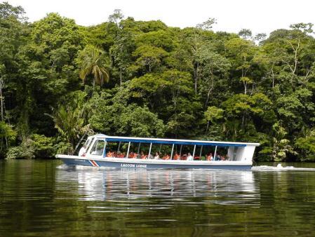 At a nearby port, board a motor launch that takes you to the canals in the heart of the Costa Rican jungle with their unique flora and fauna.