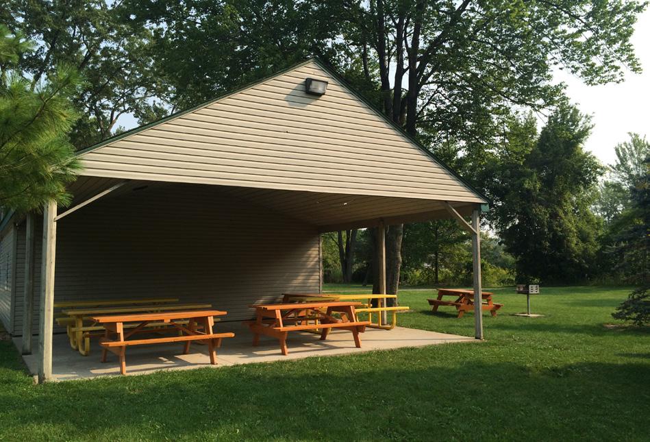 Visitors have access to 12 picnic tables (6 each), electricity, a nearby playground area, indoor restrooms (not attached), water in restrooms only, 2 sand volleyball courts (must provide balls), a
