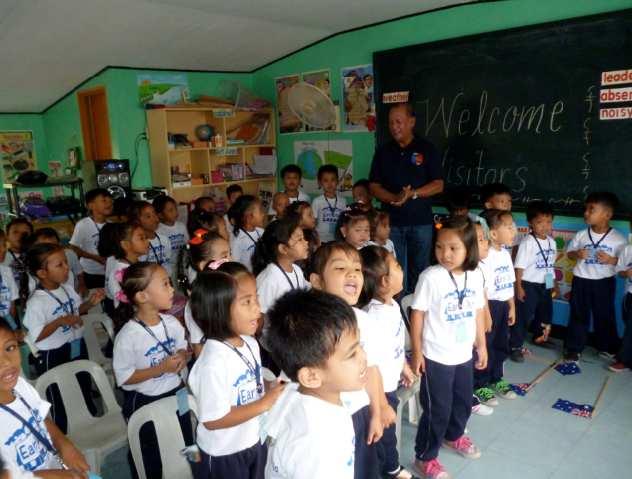 8 President Hal Radin, on a trip to the Philippines, visited the