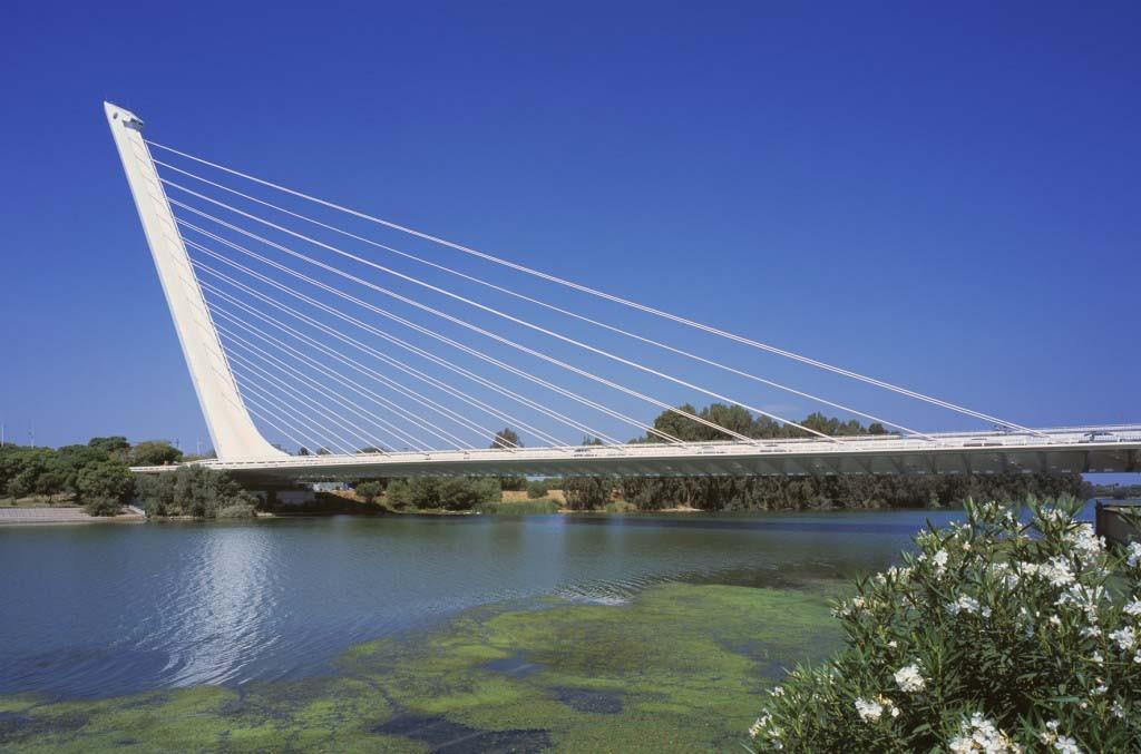 undeveloped island La Cartuja Four new bridges were built, of which Calatrava designed two The bridge form has been compared to a harp, ship's mast, and swan photo: Peter