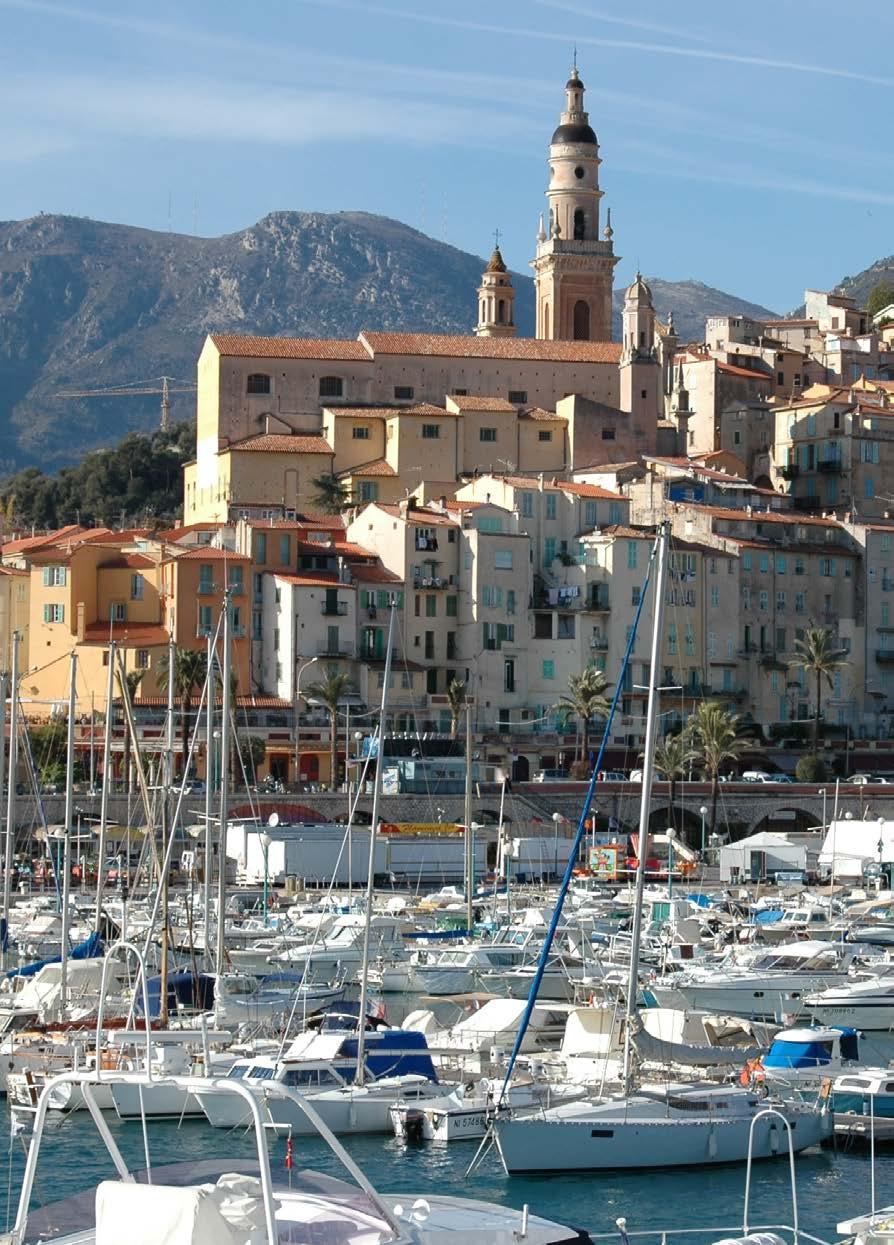 Summer in Menton The last French town before the Italian border, Menton is an international beach resort known for its mild climate, the Lemon Festival, and its exotic gardens Participants at this