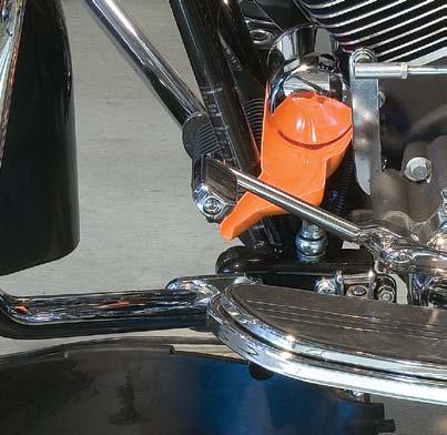 MESS Fits most Harley models Hangtab for use on pegboards Doubles as a refill funnel Punch and drain