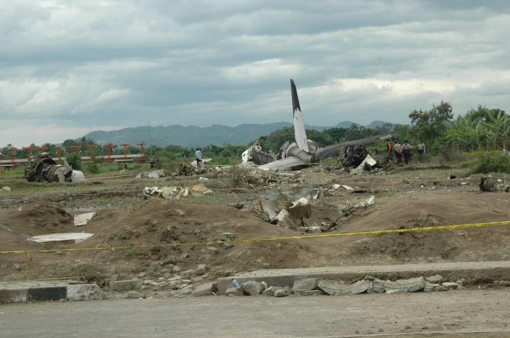 About 160 meters from the end of runway 09, the aircraft crossed a road and the nose of the aircraft impacted an embankment as the engines impacted a concrete gutter (Figure 6).