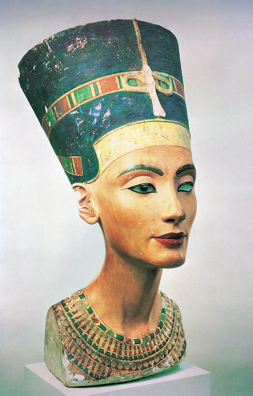 Nefertiti, 1353-1335 B.C.E., Limestone, Egyptian Museum, Berlin King Akhenaten wife! CONTEXT : Amarna Period made statues more realistic looking, but also an exaggeration.