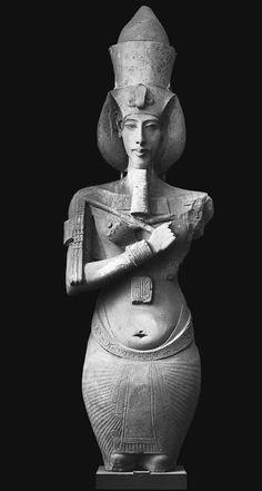 Akhenaton c. 1353-1335 B.C.E. sandstone, Egyptian Museum, Cairo CONTEXT : Akhenaton sculpture. FORM/COMPOSITION :Keeps the standards of the Frontal Pose. Curvy contours. Weak arms, not strong.