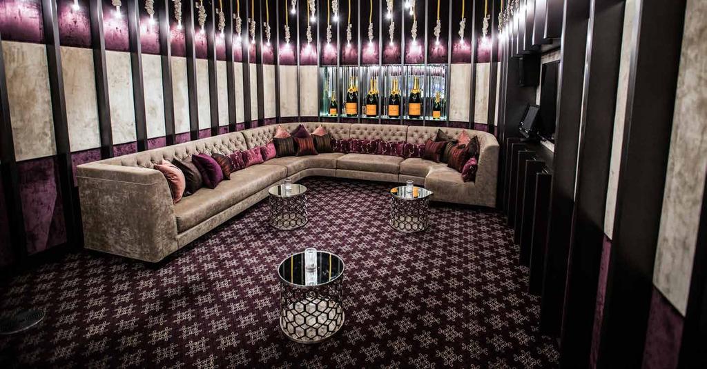 // CHAMPAGNE LOUNGE 35 GUESTS CHAMPAGNE LOUNGE // An opulent VIP room with dedicated wait staff Club 23 s Champagne Lounge is a lavish but intimate room with luxurious textured furnishings in an