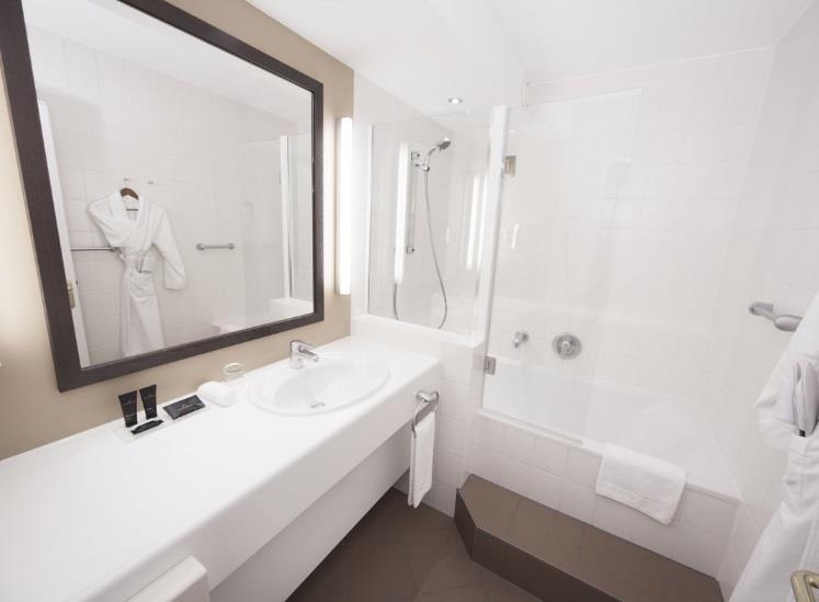 A suite contains in addition to the normal equipment following extras: Jacuzzi Whirlpool Nespresso Machine luxury separate sitting area possibility