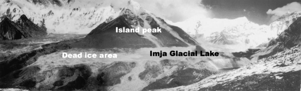 Sakai et al. 31 Fig.,. Photograph of Imja Glacial Lake from left side, BM,*. Island Peak can be seen in front. verged with it.