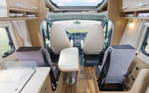 RAM A Safe in the second row: single seat with 3-point B Fully integrated in the seating group: the C safety belts and reading lamp on the T 598. swivel driver's cab seats in living area design.