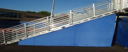 BLEACHER SAFETY SAFE T SIDES: 14 OUNCE VINYL COATED POLYESTER MATERIAL MADE TO HANG FROM BLEACHER UNDERSTRUCTURE SAFE T SIDES ENCLOSE THE ENDS OF THE BLEACHER MAKING THE UNDERSTRUCTURE UNACCESSIBLE