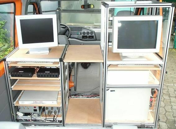 Figure 3-3: Hardware and computer racks in the back of TUD s Navigation Test Vehicle In its standard configuration, TUD s Navigation Test Vehicle is equipped with at least two PCs interconnected by