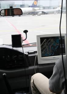 Figure 3-4: LCD screen installation in front of passenger seat The test van has the permissions necessary to operate on the movement area of Frankfurt airport (EDDF).