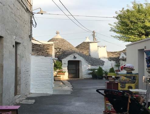 Day 9 Sunday 9 th September Visit to Alberobello & Polignano Page 7 Alberobello has been made a UNESCO World Heritage site for its unusual trulli, the characteristic white-washed conical-roofed
