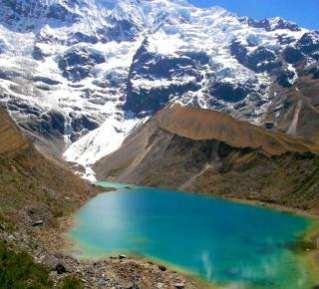 DAY 2 HIKE TO HUMANTAY LAKE DAY 3 CROSSING SALKANTAY PASS Today you will join your guide for an acclimatization hike on the slopes above the Salkantay Lodge to Lake Humantay, fed by the hanging