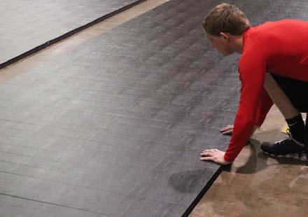 2 3 Unroll the mats so that the vinyl side is now facing up (fig. 3). Notice the way the mats are rolled, vinyl side facing in.