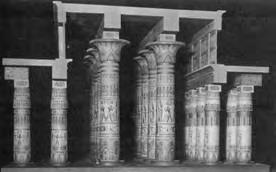 The columns were carved with extensive hieroglyphs and topped by opened papyrus flowers on the two center rows and closed papyrus buds on the sides.