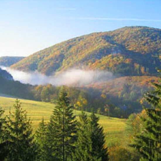 It is beautifully surrounded by the Gasienicowe Tarns Valley, the Goryczkowa Valley, the Kasprowa Valley, and (in Slovakia) the Silent Valley.