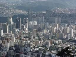 Venezuela( Capital: Caracas ) Location Venezuela is bordered by the Caribbean Sea to the North, Guyana