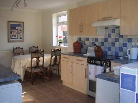 is fully equipped with a gas cooker, microwave, fridge/freezer and dishwasher.