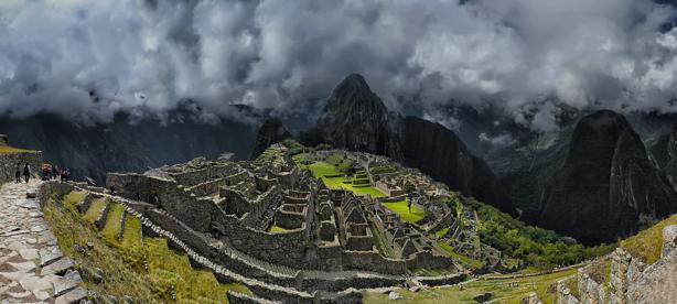 ANCIENT EMPIRE OF THE INCAS Photo: Alberana, Wikipedia Commons A view of Machu Picchu, with neighboring peak Huayna Picchu in the background The famous Inca Empire existed in the Andes Mountains,