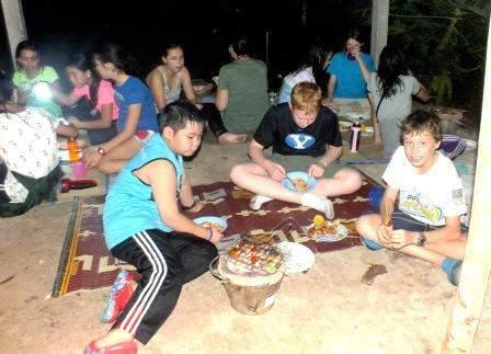 AT PETCHARAT Children work together to cook a meal with our evening barbecue activity.