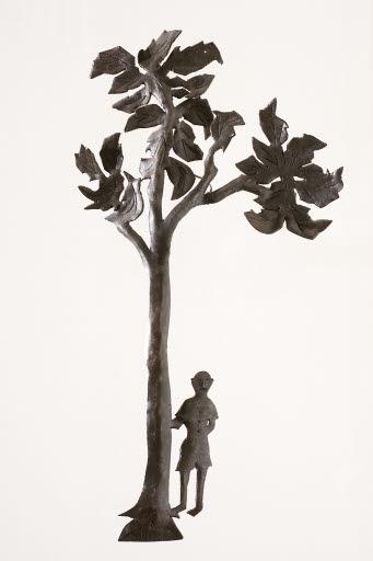 J. Maison IX man standing by a tree, circa 1970 metal