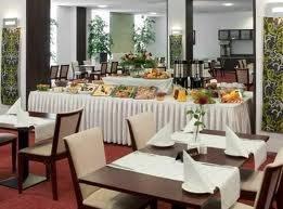 A varied buffet breakfast is served every morning at the hotel restaurant, Impresja, which specialises in