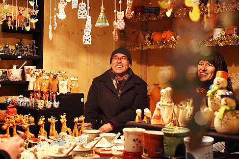 Festively decorated green stalls, designed specially for the fair, sell a fine choice of products