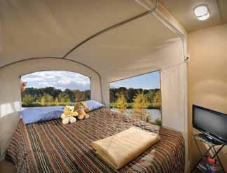 In the back you will find a full walk in expandable, equipped with a plush queen air mattress, and