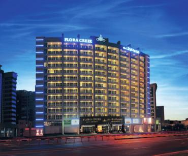 Olive Tree Flora Creek Hotel Apartments Location: Deira Overlooking the famous Dubai Creek, the Flora Creek Hotel Apartments is a new brand of deluxe all suite full hotel services or self-catering