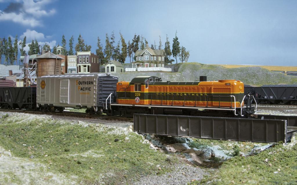 Stats: Layout Owner: Tom Enloe Layout Name: Pacific Northwestern Railroad Prototype: Southern Pacific, Great Northern, and the Freelanced Pacific Northwestern and Cherry Valley Railroads Locale: