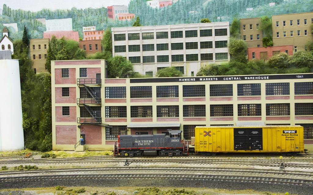 The largest town on the layout, where the railroad meets the coast, is a non-specific West Coast port somewhat similar to Portland, Oregon or Oakland, California.