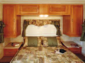 Model 30DBSS Travel Trailer Shown with Plum Interior Standard bedroom shown in Sage Green featuring