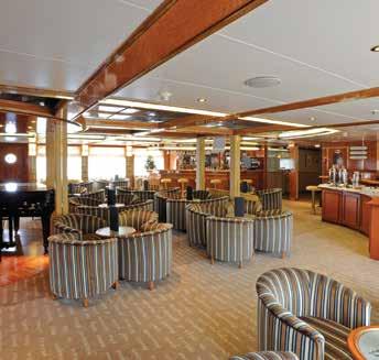 public areas and spacious outside decks. Magellan deck standard suite Library Lounge Onboard there is a high ratio of crew to passengers.