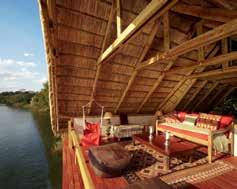 and tranquil River Club overlooking the Zambezi. Accommodation is in 11 airconditioned, open-plan suites including 1 double-storey villa providing the best possible views of the river.