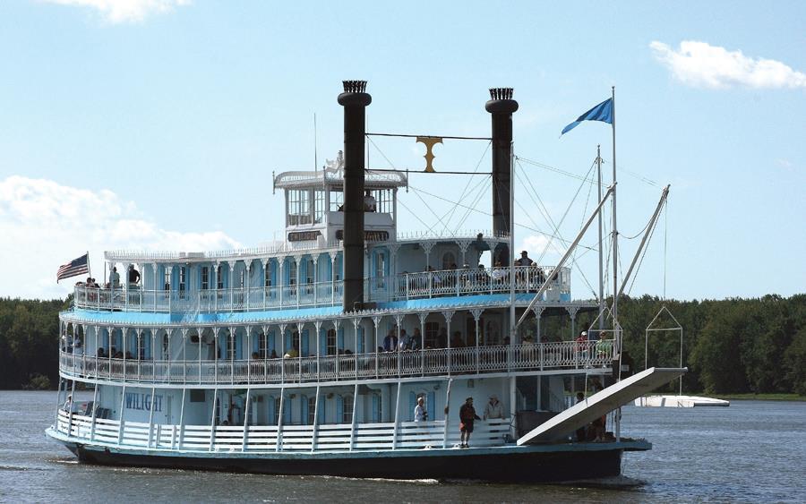 " Cruise the Mississippi River much like Huckleberry Finn except you'll be in an elegant riverboat which features three decks with Victorian steamboat architecture, both inside and out.