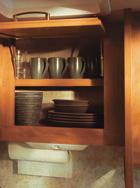 SPACIOUS OVERHEAD STORAGE in the galley