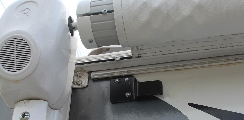 Installation 1. Extend the awning out completely according to the manufacturer s instructions. Ensure that the open roll tube slot and the slot access is down and accessible.