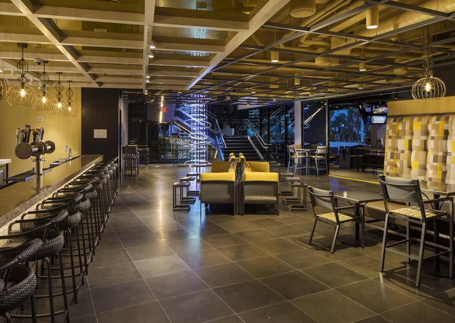 Woodard Lounge provides exclusive event space, private use of the bar, and two TV screens.