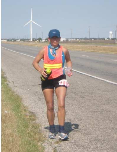 At this point we set out on highway 181 again and it s still barren with wind turbines and a nice 2% grade in full sun. At 10 am I m at mile 205 and Kristi tells me I ve run more than 200 miles!
