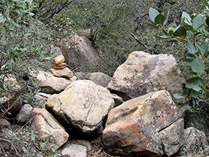 Photo 4 Brownstone Wall. The gully lies below the two turtle boulders in Photo 7. (Waypoint 13 is where Photo 7 was Photo 5 taken.