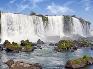Day 11 IGUASSU FALLS: BRAZILIAN SIDE Iguazú means Big Falls in Guarani, the local indigenous language. Begin your exploration in Foz do Iguaçu, located on the Brazilian side.