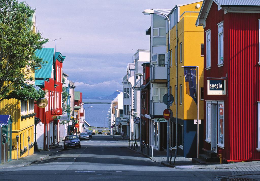 Colorful buildings line Reykjavik s streets. lunar-like volcanic craters comprise a stunningly beautiful national park.