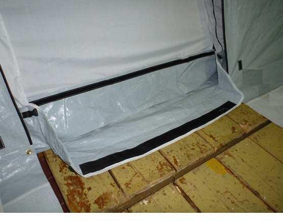 Inner tent door. Threshold is opened, flat on the ground.