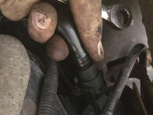 STEP 3: Install the two vent valve pipe clips into the existing underbody holes.