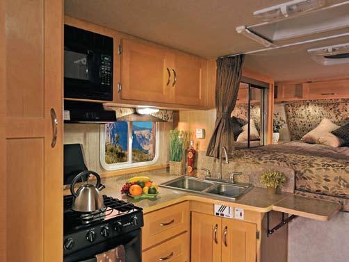 Dinette 980rds / Camel Decor The 980RDS offers a well appointed full wall slide out featuring a 6 cu.ft.