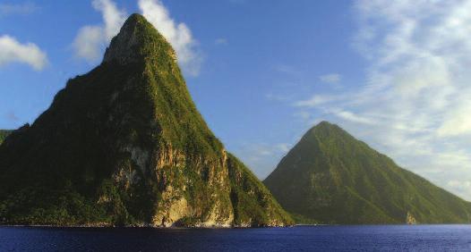 Following an afternoon at sea, the evening festivities feature a tasting of fine rums from island distilleries. Famous Pitons on St. Lucia. ST.